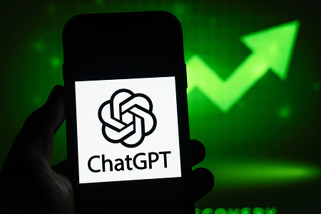 In this photo illustration, the Chat GPT (Open AI) logo is displayed on a smartphone screen.