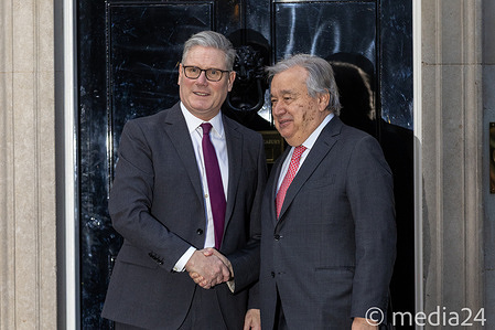 British Prime Minister Sir Keir Starmer shakes hands with UN Secretary-General Antonio Guterres at 10 Downing Street during his visit to London