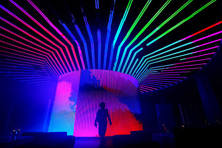 Silhouette of a woman in the light tree during the inauguration of BLOQUE. The Municipality of Querétaro inaugurated the BLOQUE Innovation and Creative Technology Center project, a seven-level technology ecosystem, created to offer 'showroom' experiences and interactive areas, unique in Mexico, to bring training closer and promote entrepreneurship.