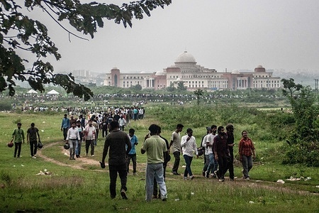 Demonstrators advance toward the state assembly building during a rally against alleged Jharkhand Public Service Commission and Jharkhand Staff Selection Commission exam irregularities.