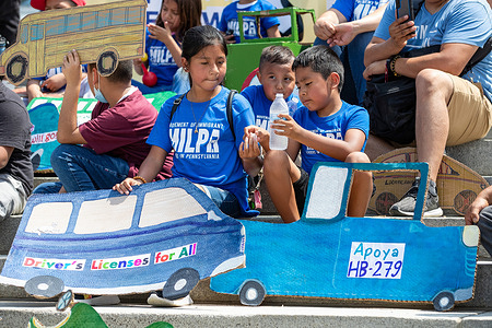 Children, parents and young adults gathered on the steps of the Pennsylvania State Capitol in support of HB-279, a bill which would allow all Pennsylvanians to obtain a driver's license regardless of immigration status.