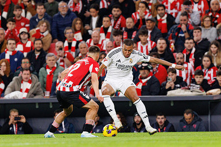 (L-R) Andoni Gorosabel (Athletic Club) and Kylian Mbappe (Real Madrid FC) seen in action during LaLiga EA SPORTS game between Athletic Club and Real Madrid FC at Estadio de San Mames. Final score Athletic Club 2:1 Real Madrid FC