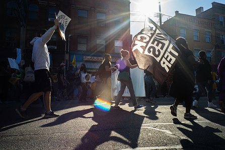 A protester waving a Black Lives Matter flag takes part during the demonstration.Hundreds of Pittsburgh residents march down E Carson Street on the city's south side following news that Joe Biden won the 2020 Presidential Election on Saturday, November 7, 2020. The rally was originally scheduled as a "Count Our Votes" event similar to ones that have occurred throughout the city, state and nation.