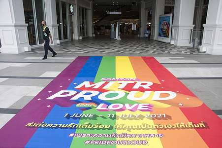 View of a huge rainbow flag placed at the entrance of Samyan Mitrtown shopping mall.
Samyan Mitrtown, a mixed-use shopping, office, residential and leisure development celebrated the LGBTQ Pride Month 2021 by decorated the floor at the entrance and the tunnel of the mall with the huge and long rainbow flag. "Samyan Mitr Proud 100% Love" in Bangkok, Thailand.