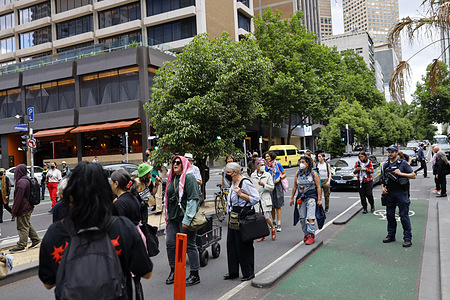 Protestors march through the streets during the demonstration.  A rally is held outside Parliament to oppose the proposed anti-protest legislation. The “Justice Legislation Amendment (Police and Other Matters) Bill 2025” would grant Victoria Police greater powers to unmask protesters if officers reasonably believe someone has committed or intends to commit an offence. The bill also introduces a ban on face coverings at protests except for religious, cultural or medical reasons with fines for non-compliance. Organisers say the changes threaten the right to peaceful dissent, while the government argues they are necessary to prevent violent or extremist behaviour.