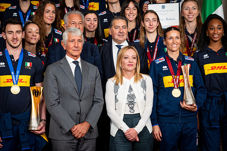 Andrea Abodi, an Italian politician and business executive, and Italian Prime Minister Giorgia Meloni meet with the world-champion men's and women's national volleyball teams at Palazzo Chigi in Rome.