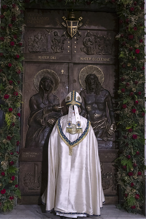 Cardinal Rolandas Makrickas presides over the rite of the closing of the holy door of the St. Mary Major Basilica as part of the end of the Jubilee Year.