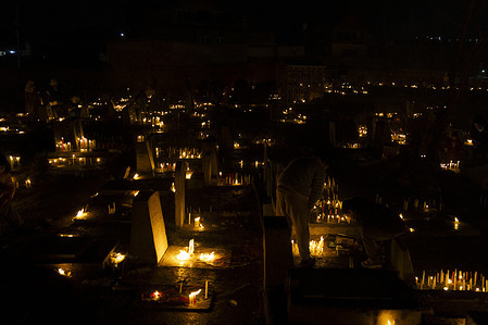 Kashmiri Shiite Muslims offer prayers and light candles at the graves of their relatives to mark Shab-e-Barat, or the Night of Forgiveness, at a graveyard in Downtown Srinagar. Shab-e-Barat is one of the holiest nights in Islam, observed between the 14th and 15th nights of Shaban, the eighth month of the Islamic lunar calendar. Muslims around the world visit graveyards to pray for the departed souls and spend the night in worship, seeking God's mercy and forgiveness. Many believe that on this night, Allah determines destinies, forgives sins, and extends His blessings to those who seek repentance.