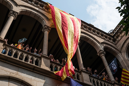 The students displayed a large Catalan flag from the top floor of the central University of Barcelona. Thousands of students occupied the University central of Barcelona as a sign of support to the Referendum in Catalonia.