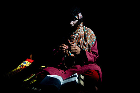 A Muslim girl prays the rosary beads during the ongoing Islamic holy fasting month of Ramadan in Srinagar. Ramadan is the ninth month of the Islamic lunar calendar, during which Muslims worldwide fast from dawn to sunset, refraining from food, drink and marital intimacy as a form of spiritual reflection, prayer and charity. Muslims believe the Quran was first revealed to the Prophet Muhammad during this month. Ramadan is the ninth month of the Islamic lunar calendar, during which Muslims worldwide fast from dawn to sunset, refraining from food, drink and marital intimacy as a form of spiritual reflection, prayer, and charity. Muslims believe the Quran was first revealed to the Prophet Muhammad during this month.