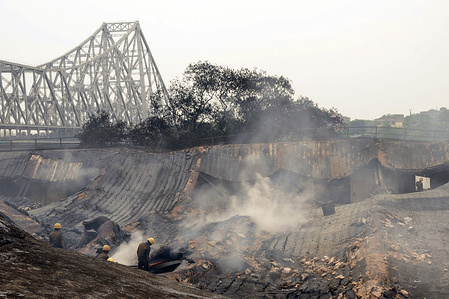 Aftermath of a massive fire that destroyed a chemical plant near Howrah's Jagannath Ghat. The cause of the fire and damages are still uncertain as the police is still investigating the cause of the fire.