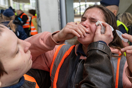 An activist reacts after having been sprayed in the face by a driver during a blockade by the Last Generation (Ostatnie Pokolenie) group. On May 10 2025 around 15 individuals from the activist group "Ostatnie Pokolenie" ("Last Generation") staged a traffic blockade on Grota-Roweckiego Bridge marking the fifth consecutive day of similar actions across the city. Demonstrators glued themselves to the roadway using industrial-strength adhesives temporarily halting vehicle flow and drawing police intervention. The protest aimed to raise awareness of regional transportation issues. Isolated incidents of tension were reported during the event including verbal altercations and a civilian using pepper spray. The group has stated it will continue the campaign throughout May.