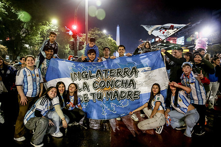 Argentina fans with a giant flag seen celebrating for qualifying for another World Cup final. Final score: England 1:2 Argentina