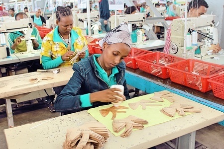 Employees of the Huajian, Eastern Industrial Zone, shoe manufacturing park at work in Addis Ababa. The visit to the Chinese owned company which employs 4000 Ethiopians, 60 percent of whom are women, was organised by Oxfam International Africa-China Dialogue Platform (ACDP) and Wits Africa-China Reporting Project as part of the Media Workshop on Reporting Africa-China Engagements: Agriculture Developments, Climate Change, Industrialization, Sustainable Development Goals (SDGs), and Agenda 2063. The four day event ends on September 7th.