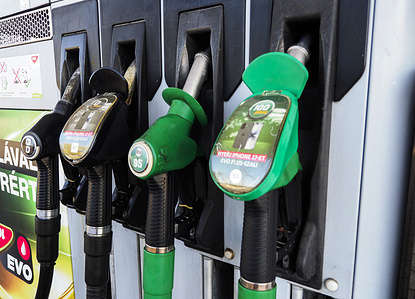 A view of fuel dispenser nozzles for diesel and unleaded gasoline at a MOL gas station.