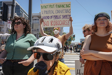A man holds a placard during the protest. On the morning of August 7th, the San Francisco Taxi Workers Alliance orchestrate a protest outside the headquarters of the California Public Utilities Commission in San Francisco, vehemently opposing the expansion of driverless car fleets within the city. With impassioned determination, protestors gather to express their strong dissent against the presence of two companies, Waymo and Cruise, providing driverless commercial passenger services. Concerns resonate deeply as demonstrators rally against the perceive threat to the livelihoods of taxi drivers, asserting that the proliferation of driverless vehicles would lead to the erosion of job opportunities in San Francisco. Beyond economic worries, the protestors also highlight the perceive peril of driverless commercial passenger services, pointing to past instances of traffic accidents involving autonomous taxis.