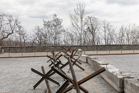 Hedgehogs that served as protection during the war are seen along the street in Kyiv. The Ukrainian capital Kyiv has come under regular attack from Russian forces located on the outskirts of the city. Russian bombardments have hit a number of civilian targets including a major shopping mall. Taking Kyiv is seen as a key objective for Russian forces. Anti-tanks and other defenses have been put up around the city to slow down a Russian assault.