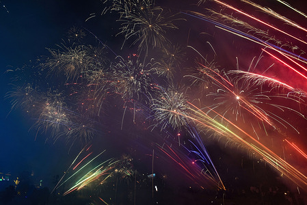 People set off hand-held fireworks by a river to celebrate the arrival of 2024 in Fuyang, in the early morning of January 1, 2024.
