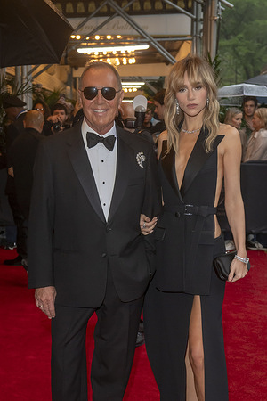 New York, United States - 05/05/2025 17:01:32: (L-R) Michael Kors and Suki Waterhouse wearing Michael Kors depart the Pierre Hotel for 2025 Met Gala in New York City.