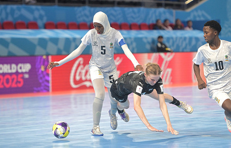 Jamie Joy Evans (R) of New Zealand Women Futsal team and Fatuma Issa Suleimani (L) of Tanzania Women Futsal team seen in action during the Group C First Stage match between New Zealand and Tanzania at the FIFA Futsal Women's World Cup 2025 held at PhilSports Arena. Final score Tanzania 4 : 2 New Zealand