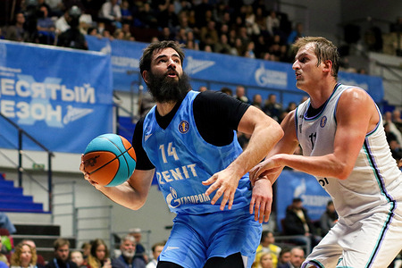 Bojan Dubljevic (14) of Zenit Saint Petersburg and Vladimir Ivlev (11) of Pari Nizhny Novgorod in action during the VTB United League basketball match, Regular Season, between Zenit Saint Petersburg and Pari Nizhny Novgorod at Arena. 
Final score; Zenit 68:65 Pari Nizhny Novgorod.