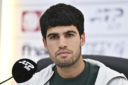 Carlos Alcaraz of Spain speaks during a press conference after defeating Arthur Rinderknech of France in their men's singles Round of 32 match at the ATP Qatar ExxonMobil Open 2026 at the Khalifa International Tennis Complex. Carlos Alcaraz won against Arthur Rinderknech 6-4,7-6.  