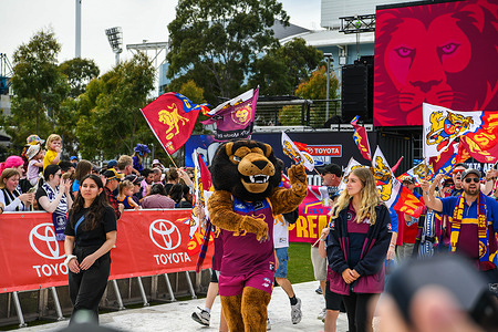 Brisbane Lions fans and mascot are seen at the 2026 AFL Grand Final parade at the Olympic Park in Melbourne.