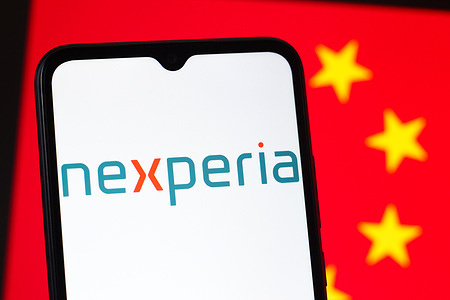 In this photo illustration, the Nexperia logo is seen displayed on a smartphone screen with the Chinese flag in the background.
