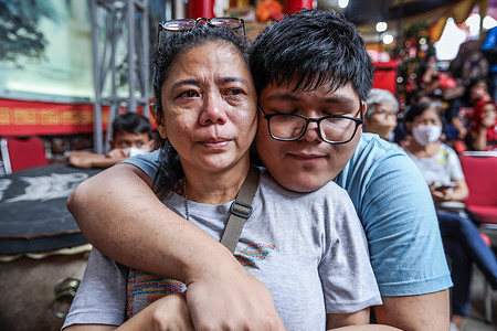 A child hugs his mother ahead of the Cap Go Meh festival, marking the end of Chinese Lunar New Year celebrations at Dhanagun temple. As the celebrations come to an end, Chinese Indonesians are teaching children to wash their mother's feet to express their gratitude. ''Washing parents'' feet is a Chinese tradition for thousands of years. This is to respect diversity in the way others celebrate (Mother's Day holiday).