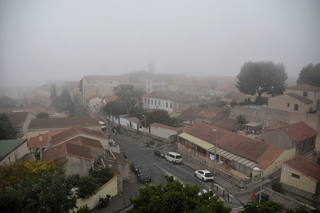 View of Marseille on a foggy day.