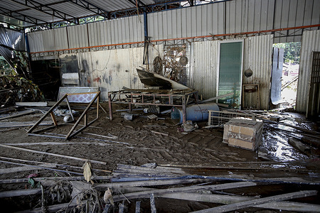 A damaged wooden Malays house is seen on a riverside after the massive floods at Hulu Langat, the outskirts of Kuala Lumpur.
The death toll due to the flood disaster in the country has risen to forty-seven, five are still missing.