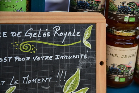 Royal jelly seen during the honey and bee festival in Lyon. Honey and bee festival on the Place des Terreaux in Lyon.