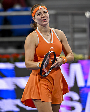Karolina Muchova of the Czech Republic celebrates after winning against Maria Sakkari of Greece ( not in view) in the women's singles semifinal match at the WTA Qatar TotalEnergies Open 2026 tennis tournament at the Khalifa International Tennis Complex. Karolina Muchova won against Maria Sakkari 3-6,6-4,6-1.
  