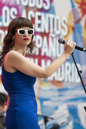 Singer Natalia García Poza known artistically as Nat Simons performs during the presentation of Hispanicity 2026 at the Casa de Correos.