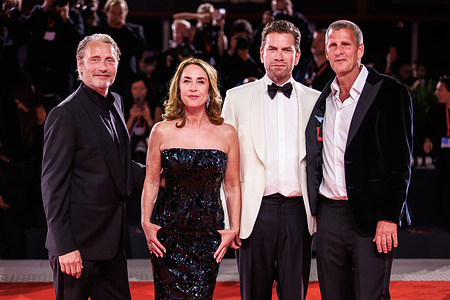 (L-R) Mads Mikkelsen, Sofie Gråbøl, Nikolaj Lie Kaas and Anders Thomas Jensen attend the red carpet of the film "Den sidste viking (The Last Viking)" at the Palazzo del Cinema during the 82nd Venice Film Festival.