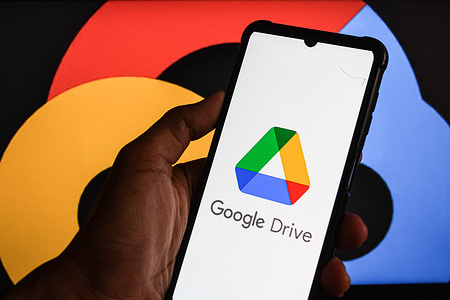 In this photo illustration, the Google Drive logo is seen displayed on a smartphone screen.