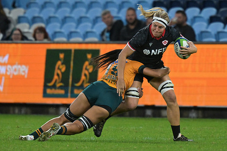 Atasi Lafai (L) of Australia women rugby team and Courtney Holtkamp (R) of Canada women rugby team are seen in action during the Pacific Four Series 2024 match between Australia and Canada held at the Allianz Stadium. Final score; Australia 17:33 Canada.