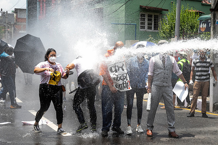 Police spray youths using a water canon during a protest as they demand a better and effective response from the government in the fight of the novel Coronavirus (COVID-19) disease.
As COVID-19 cases increase, government has increased the period of lockdown countrywide.
Nepal has so far confirmed 3,978 coronavirus cases with 14 deaths and 488 recovered cases.