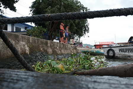 Locals cast their fishing rods in Laguna Lake in Binangonan. On World Lake Day, environmental campaigners are raising the alarm over Laguna de Bay, a crucial Philippine freshwater ecosystem suffering from mounting urban pollution. Ringed by 18 municipalities, the body of water is the country's largest lake and the third-largest in Southeast Asia, serving as a vital lifeline for local fishing communities. Despite maintaining an official Class C classification reserved for fishery protection, the lake is under heavy strain from urban expansion and agricultural runoff. Inflows of domestic waste and coliform bacteria are degrading water quality, leading to dwindling fish harvests and worsening economic hardship for nearby families.