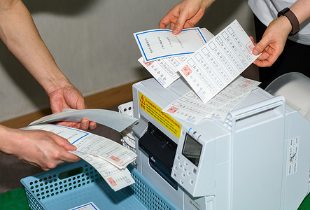 South Korean officials are preparing ballot papers for home voting for the upcoming presidential election at an election office. Home voting is a system that allows voters who have difficulty visiting polling stations due to physical disabilities, soldiers working on bases or ships, or police officers to vote where they stay.