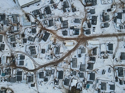 (Editors note image taken by a drone)
Aerial view, showing snow-covered camp for displaced people north of Aleppo.