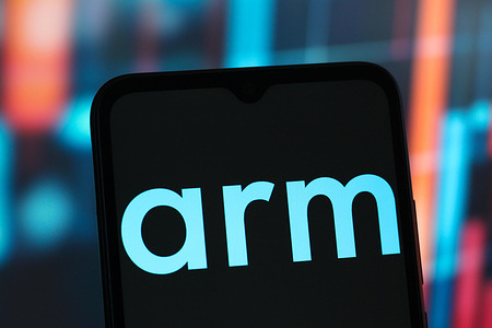 In this photo illustration, the Arm Holdings logo is seen displayed on a smartphone screen.