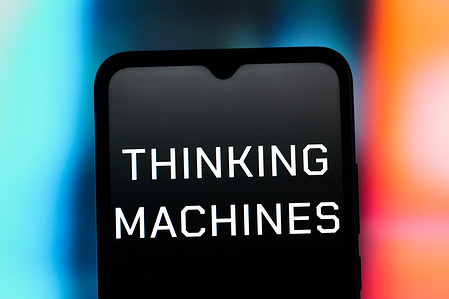 In this photo illustration, the Thinking Machines Lab logo is seen displayed on a smartphone screen.