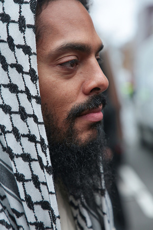 Bob Vylan looks on during a protest against Israeli attacks on Iran during Al-Quds Day in London. The annual protest, originally planned as a march, was held as a static rally after the government banned the march.