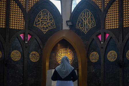 A Muslim woman seen performing the Eid al-Fitr prayer at the Islamic center of Thailand. Eid al-Fitr is a religious holiday celebrated by Muslims around the world that marks the end of Ramadan, the Islamic holy month of fasting.