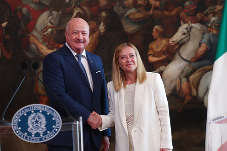 (R) Italian Prime Minister Giorgia Meloni and (L) Austrian Federal Chancellor Karl Nehammer greet each other at the end of their meeting at Palazzo Chigi.