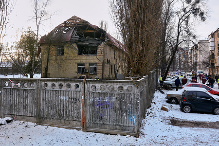 A damaged house is seen, hit by an Iranian Shahed 136 drone launched by Russia. It was reported that ten separate explosions occurred in Kyiv due to the attacks carried out by the Russian forces in the early hours of the morning. Russia attacked Kyiv on December 14, 2022 with Iranian-made kamikaze drones. As a result buildings were damaged.