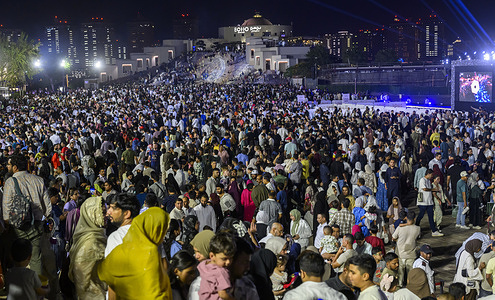 People seen at Katara Cultural Village ahead of fireworks during Eid al-Adha celebrations marking the first day of the Muslim festival of Eid al-Adha. Muslims around the world celebrate Eid al-Adha, one of IslamÕs most important holidays, which commemorates Prophet AbrahamÕs willingness to sacrifice his son in obedience to God