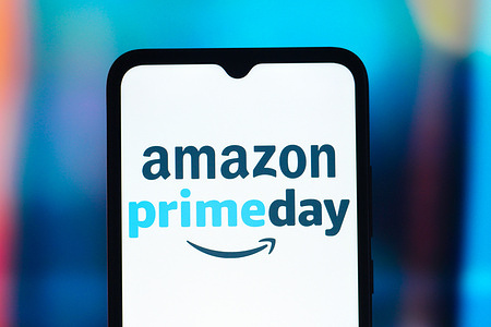 In this photo illustration, the Amazon Prime Day logo is seen displayed on a smartphone screen.