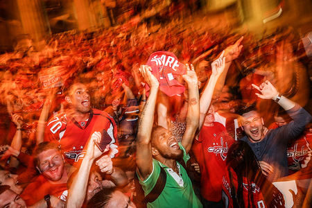 Capitals fans celebrate on the streets of Washington, DC after wining game 7 for the Eastern Cup against the Tampa Bay lightning.